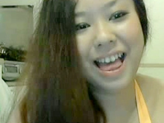 Sexy Asian babe Fuko Love's jumbo titties jiggle for the camera