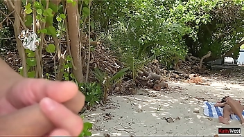 Pervert cummed on girls while they were sunbathing on a public beach